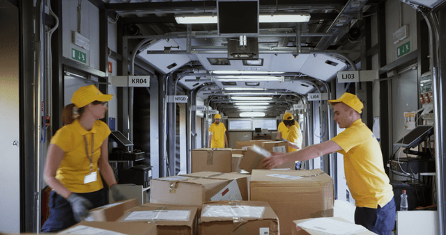 parcel distribution warehouse boxes and employees